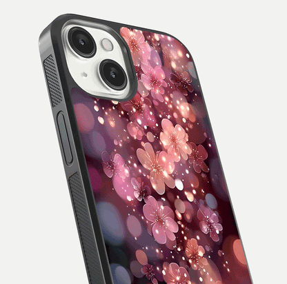 Glowing Petal Bliss Glass Case for iPhone 13 Mini close-up angled shot showing petal glow, color depth, and reflection shine