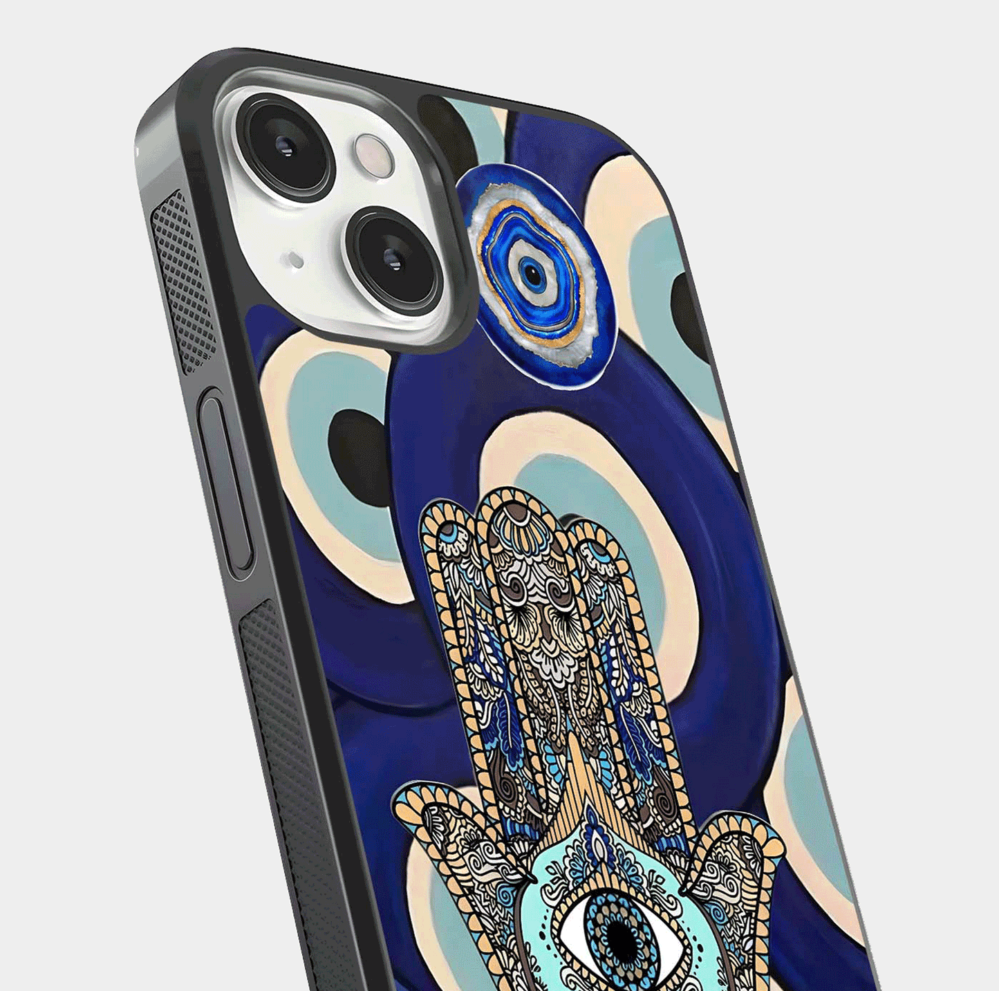 Hamsa Divine Guard Glass Case for iPhone 13 Mini close-up angled shot showing detailed palm motif and reflection glow
