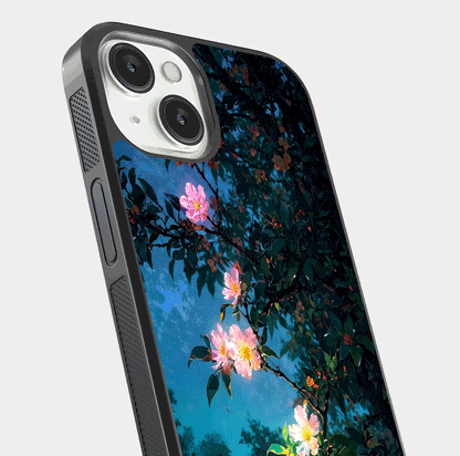Midnight Bloom Glow Glass Case for iPhone 13 Mini close-up angled shot showing petal highlights and glow reflection