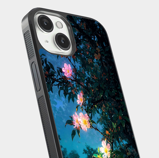 Midnight Bloom Glow Glass Case for iPhone 13 Mini close-up angled shot showing petal highlights and glow reflection