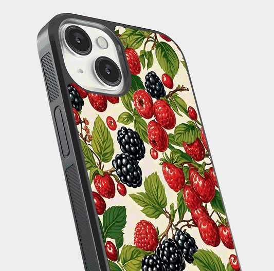 Mixed Berry Collage Glass Case for iPhone 13 Mini close-up angled shot showing fruit detail and reflection glow