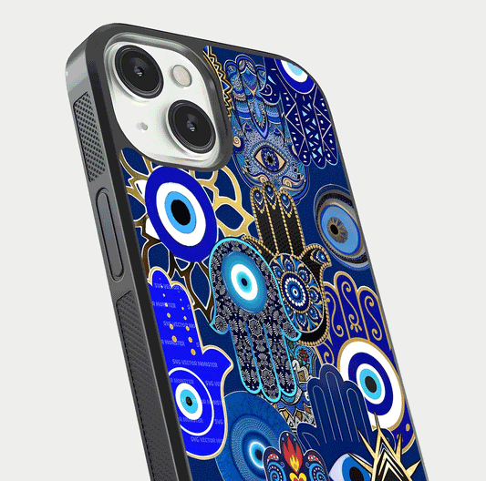 Mystic Palm Guard Glass Case for iPhone 13 Mini close-up angled shot showing eye symbol and fine texture