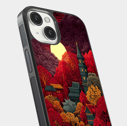 Scarlet Autumn Temple Glass Case for iPhone 13 Mini close-up angled shot highlighting golden leaves and reflection