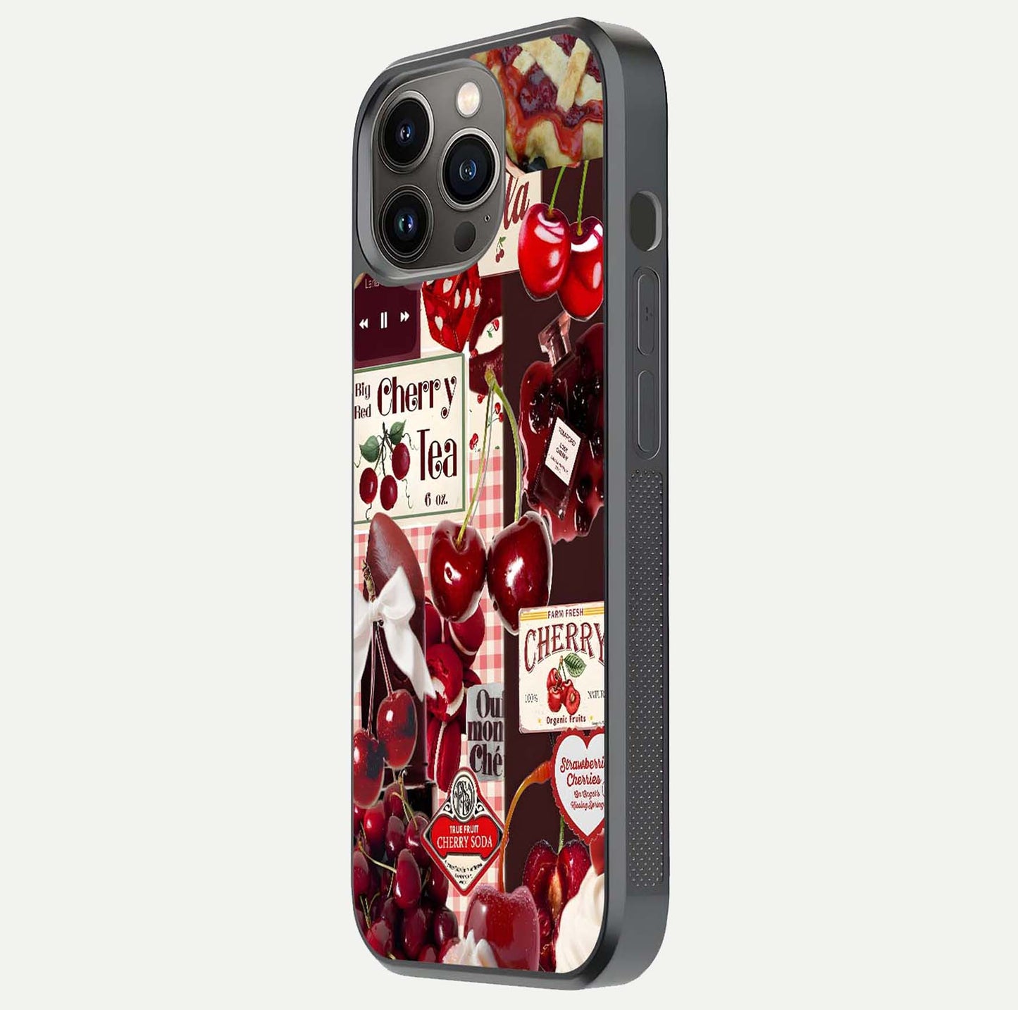 Aesthetic Cherry Tea Glass Case for iPhone 16 Pro side-angle image showing cherry collage print, camera module, and glossy finish reflection