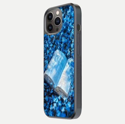 Blue Bloom Tales Glass Case for iPhone 13 Pro side-angle image showing blue floral pattern and glossy finish