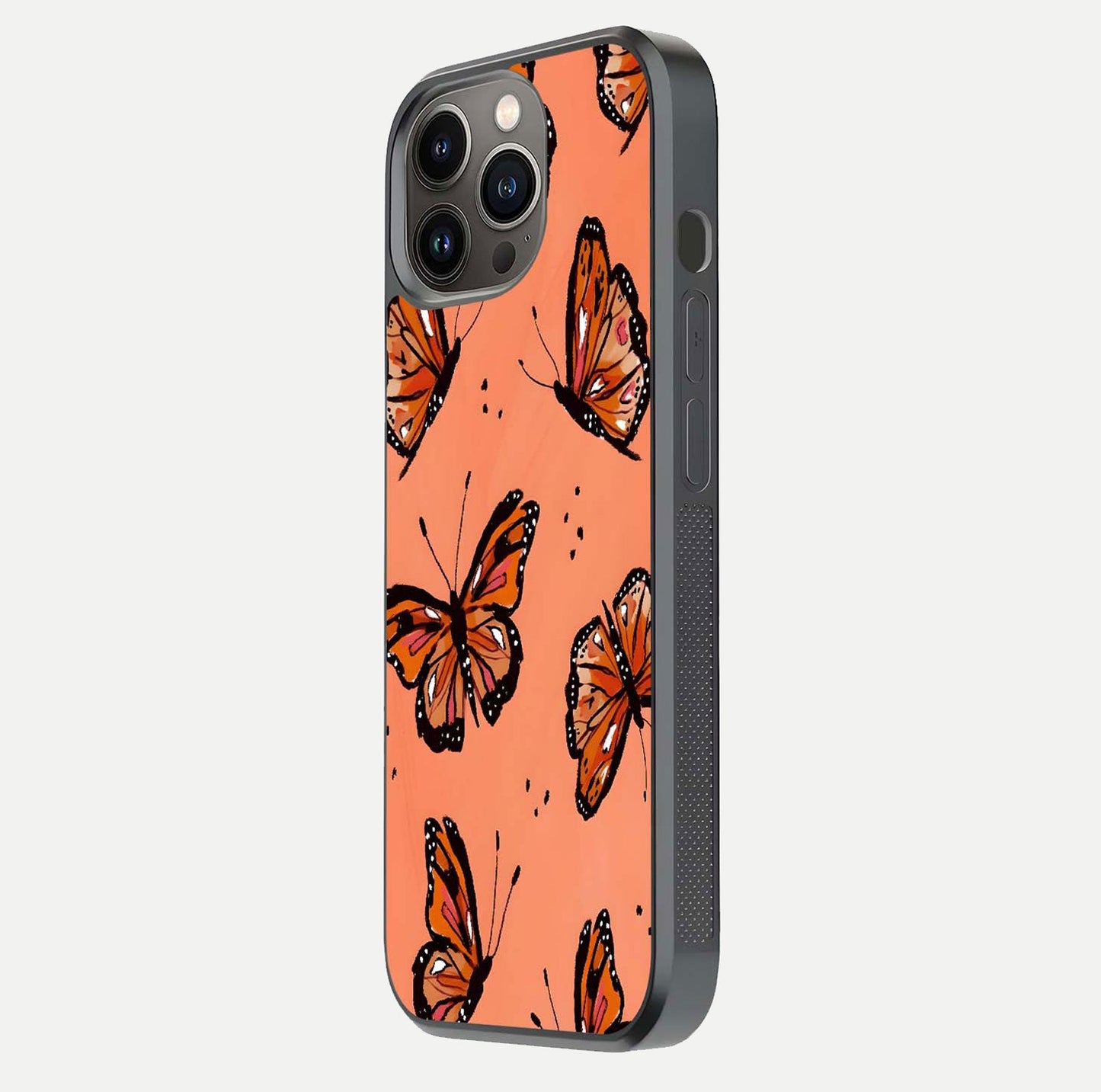 Coral Wing Butterfly Glass Case for iPhone 13 Pro side-angle photo showing reflective finish and smooth edges