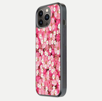 Pink Daisy Bliss Glass Case for iPhone 13 Pro side-angle image showing delicate daisy pattern and glass reflection
