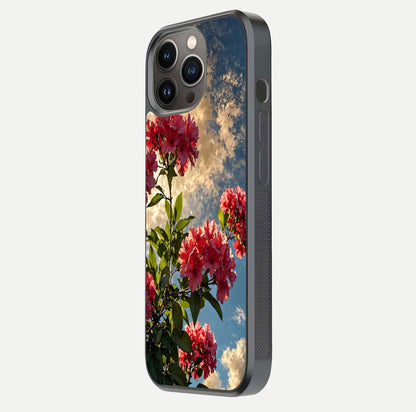 Red Bloom Skies Glass Case for iPhone 13 Pro side-angle image showing reflection, print clarity, and tone blend