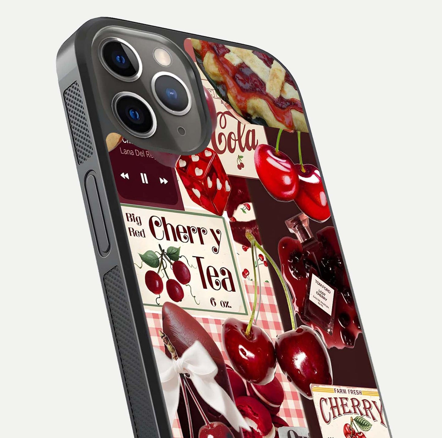 Aesthetic Cherry Tea Glass Case for iPhone 16 Pro close-up angled shot showing detailed cherry artwork, red tones, and gloss reflection