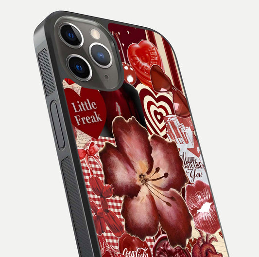 Aesthetic Little Freak Glass Case for iPhone 13 Pro close-up angled shot showing detailed artwork, bold design, and gloss reflection