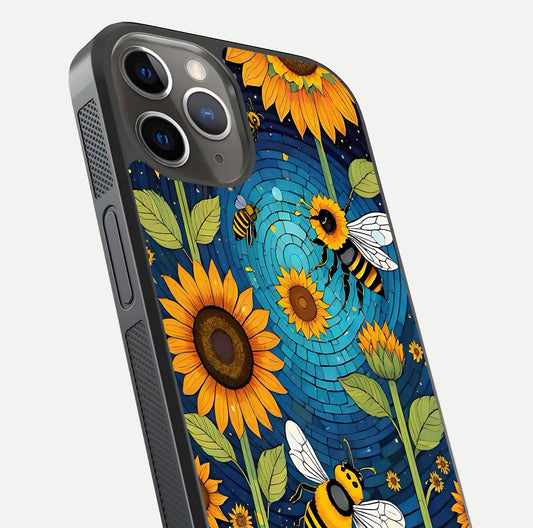 Bees & Sunflowers Glass Case for iPhone 13 Pro close-up angled shot showing detailed petals, bee prints, and glass reflection