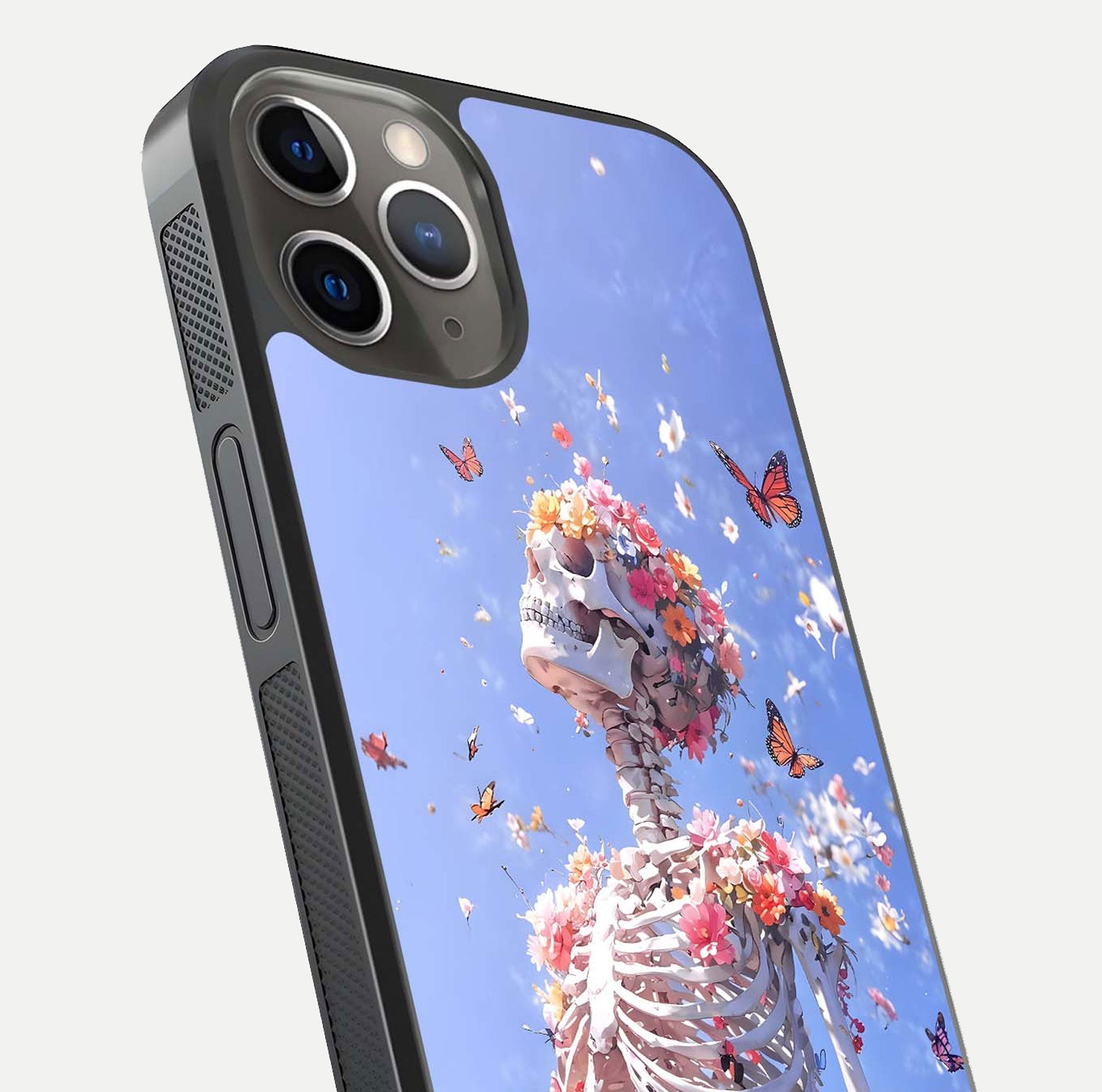 Bloom Beyond Bones Glass Case for iPhone 13 Pro close-up highlighting unique bone-floral fusion art and reflection