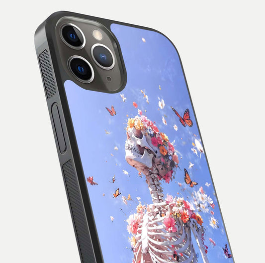 Bloom Beyond Bones Glass Case for iPhone 13 Pro close-up highlighting unique bone-floral fusion art and reflection