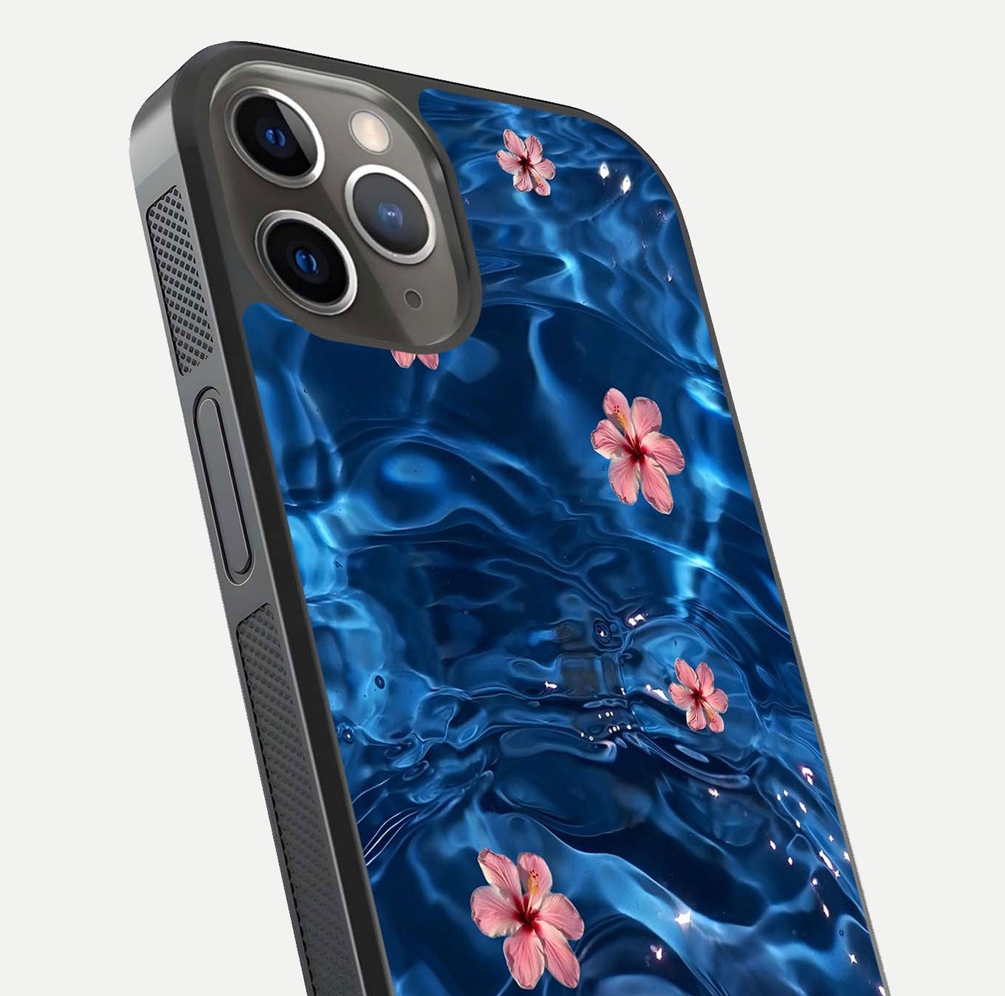 Blooming Water Drift Glass Case for iPhone 13 Pro close-up angle showing petal details, soft aqua tones, and smooth gloss reflection