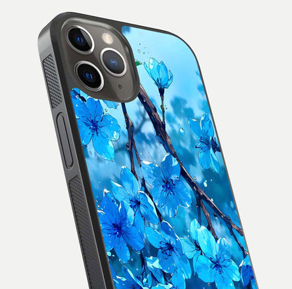 Blue Blossoms Branch Glass Case for iPhone 13 Pro close-up angle highlighting petal details and reflection gloss