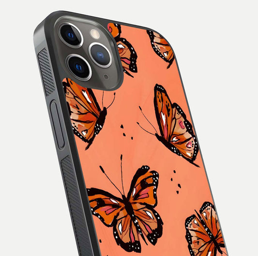 Coral Wing Butterfly Glass Case for iPhone 13 Pro close-up highlighting wing pattern, coral tones, and reflection shine