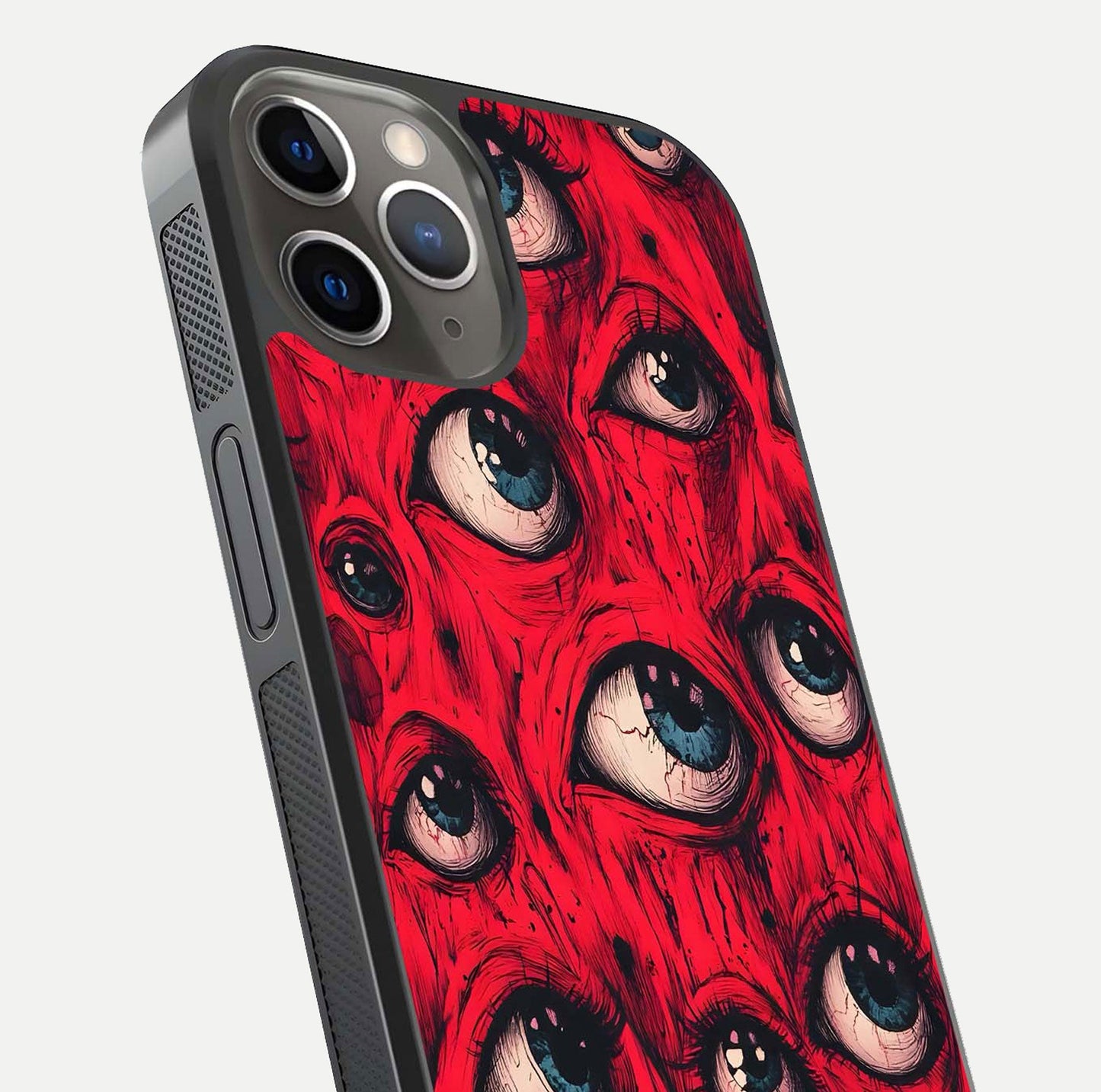 Crimson Watch Eyes Glass Case for iPhone 13 Pro close-up highlighting graphic detail and reflection