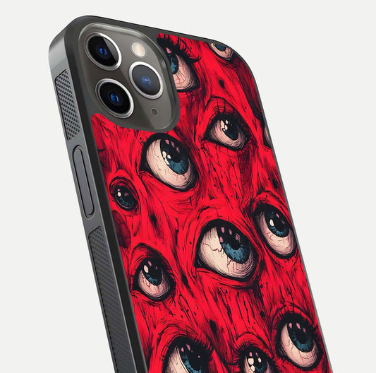 Crimson Watch Eyes Glass Case for iPhone 13 Pro close-up highlighting graphic detail and reflection