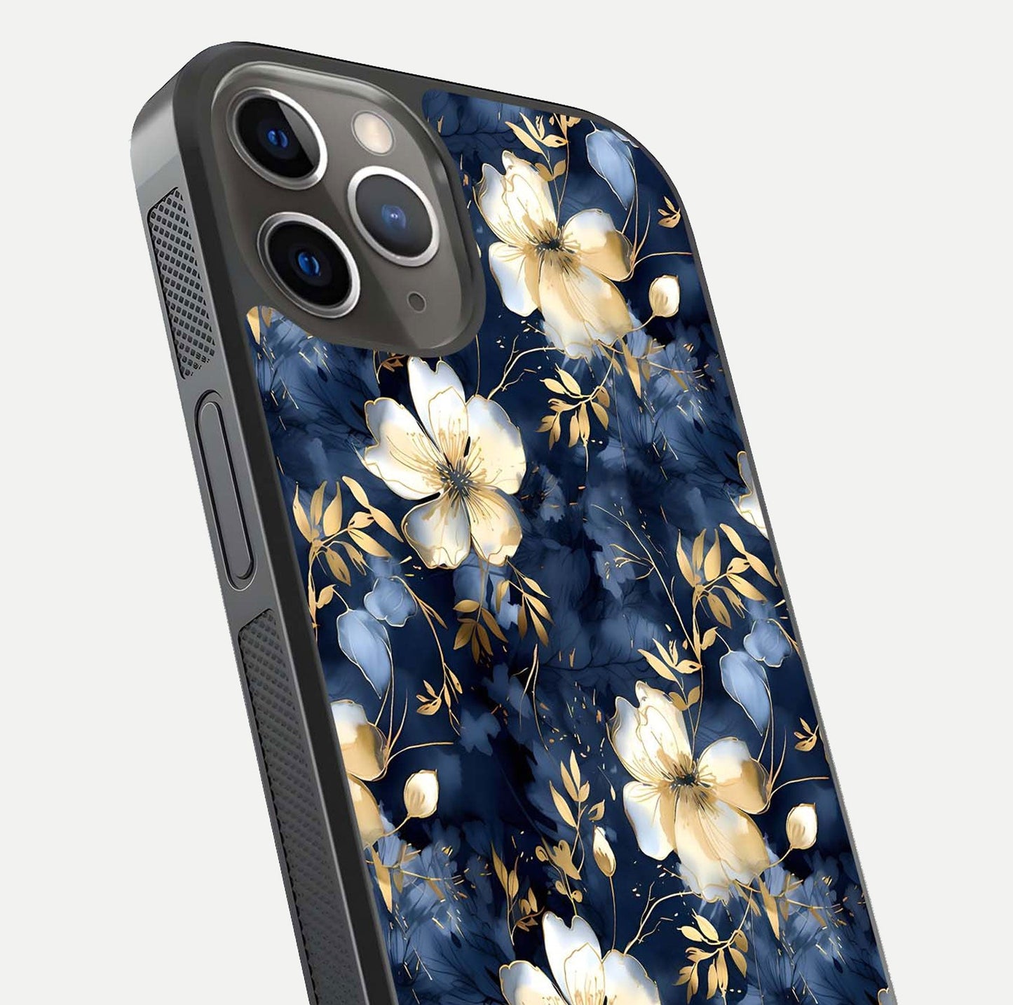 Golden Midnight Bloom Glass Case for iPhone 13 Pro close-up angled shot showing floral detail and reflection shine