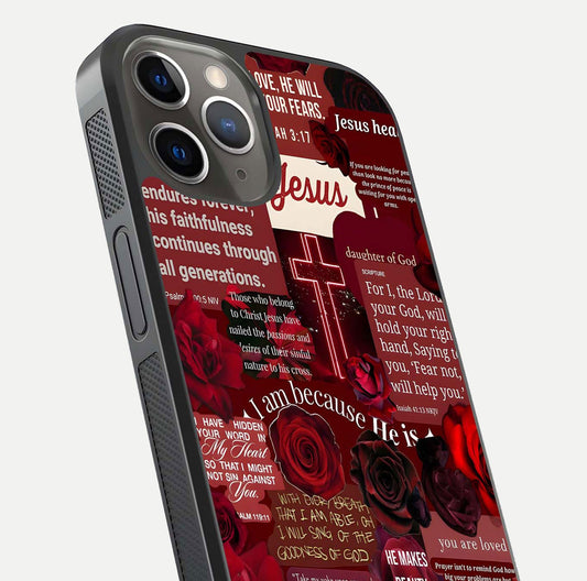 Jesus Love Heals Glass Case for iPhone 13 Pro close-up angled shot showing healing text, cross detailing, and reflection