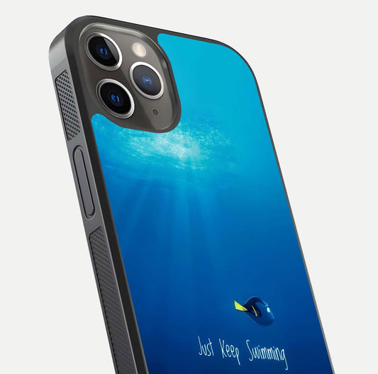 Just Keep Swimming Glass Case for iPhone 13 Pro close-up angled shot showing elegant lettering and blue tone reflection