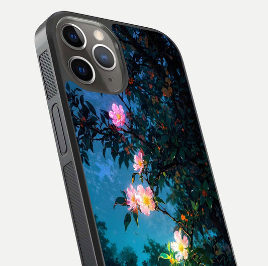 Midnight Bloom Glow Glass Case for iPhone 13 Pro close-up angled shot showing petal highlights and glow reflection