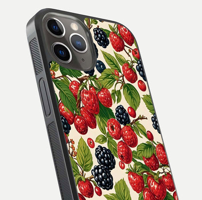 Mixed Berry Collage Glass Case for iPhone 13 Pro close-up angled shot showing fruit detail and reflection glow
