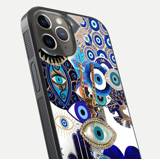Mystic Charm Eye Glass Case for iPhone 13 Pro close-up angled shot showing detailed eye art and reflection