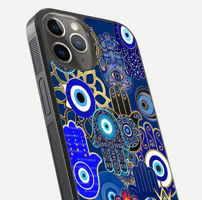 Mystic Palm Guard Glass Case for iPhone 13 Pro close-up angled shot showing eye symbol and fine texture