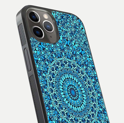 Ocean Bloom Mandala Glass Case for iPhone 13 Pro close-up angled shot highlighting detailed mandala and reflection