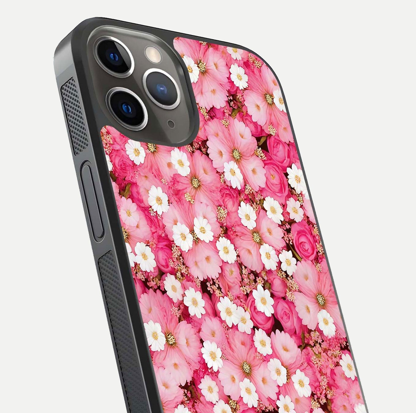 Pink Daisy Bliss Glass Case for iPhone 13 Pro close-up angled shot highlighting daisy detail and reflection glow