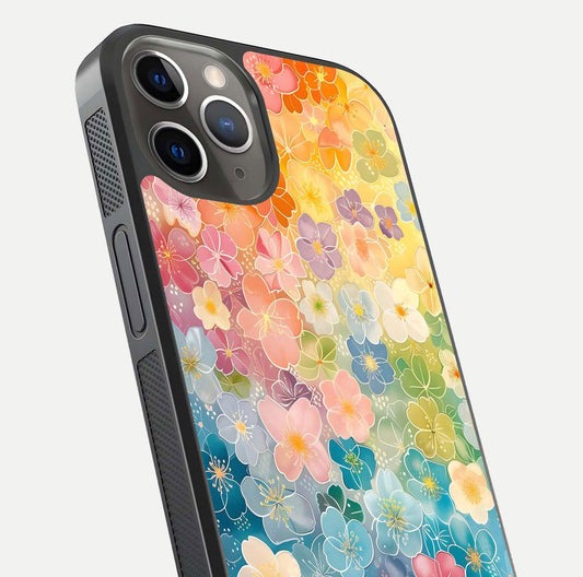 Rainbow Blossom Burst Glass Case for iPhone 13 Pro close-up angled shot showing petal colors and reflection
