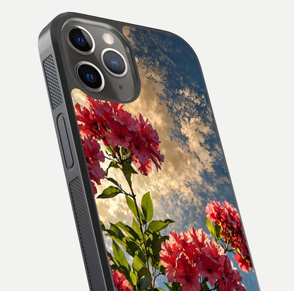 Red Bloom Skies Glass Case for iPhone 13 Pro close-up angled shot highlighting detailed blooms and reflection