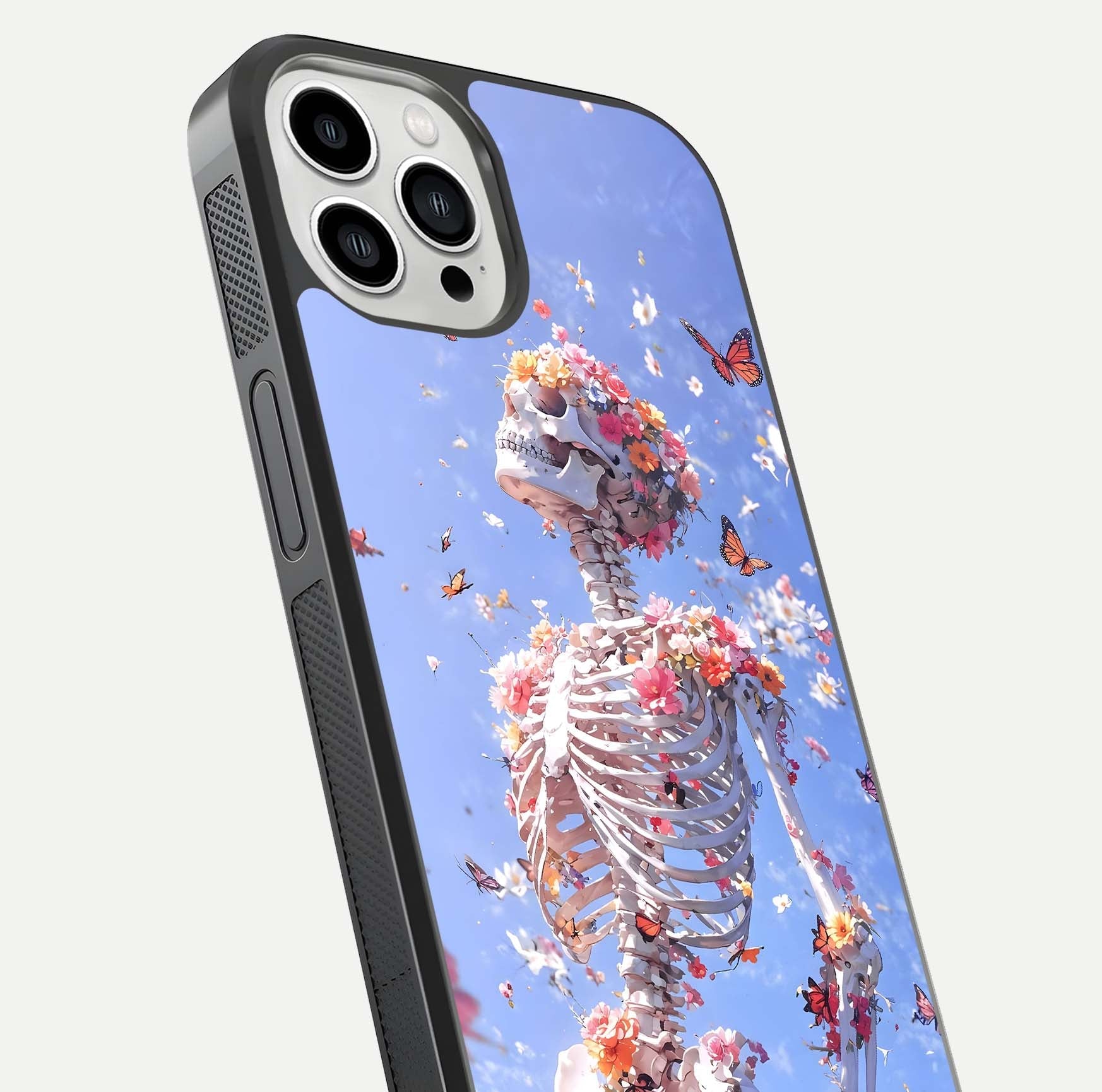 Bloom Beyond Bones Glass Case for iPhone 13 Pro Max close-up highlighting unique bone-floral fusion art and reflection