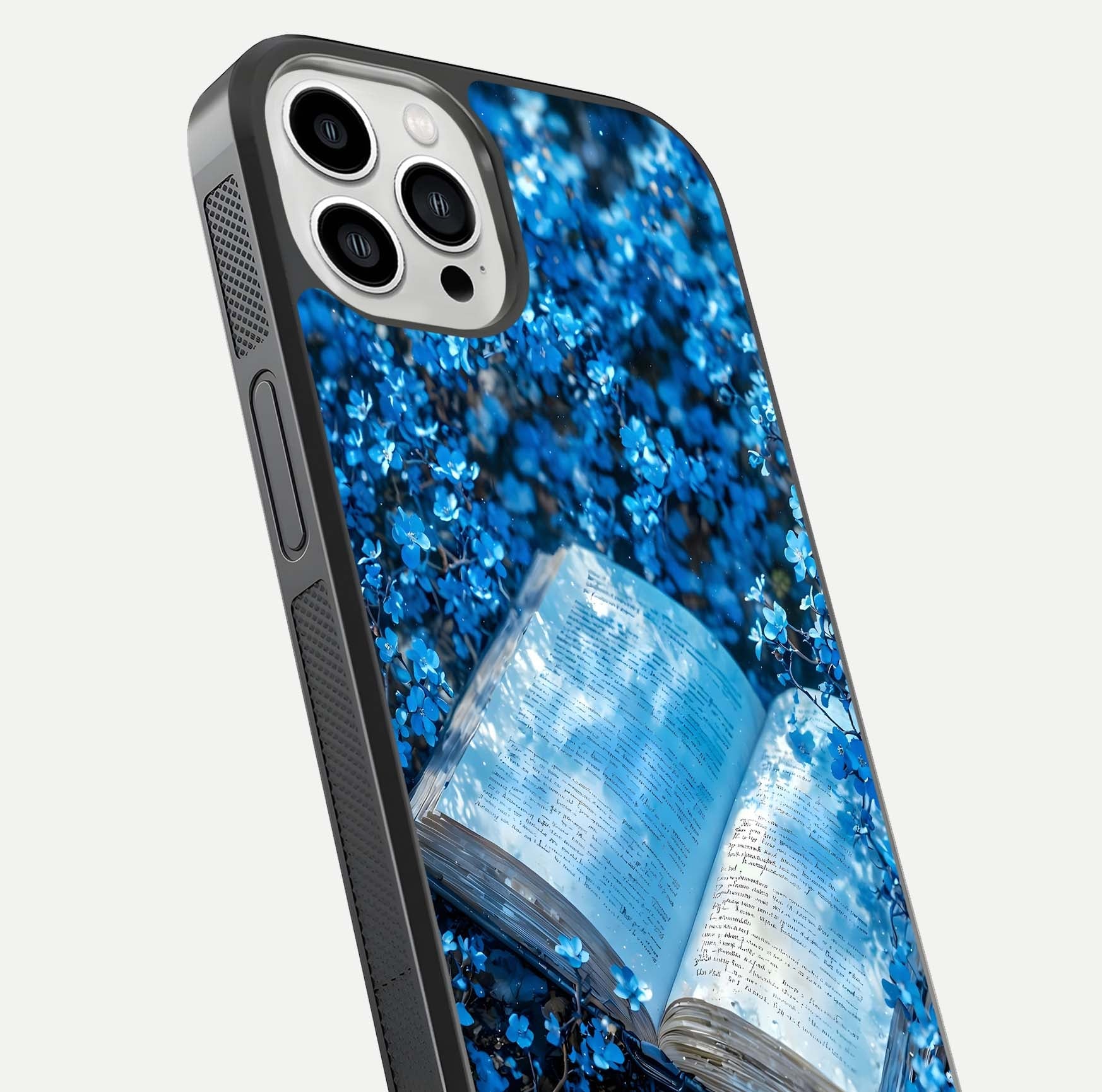 Blue Bloom Tales Glass Case for iPhone 13 Pro Max close-up angle showing petal texture and blue tone reflection
