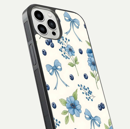 Blue Flower & Bow Glass Case for iPhone 13 Pro Max close-up shot highlighting ribbon detail and flower gloss finish
