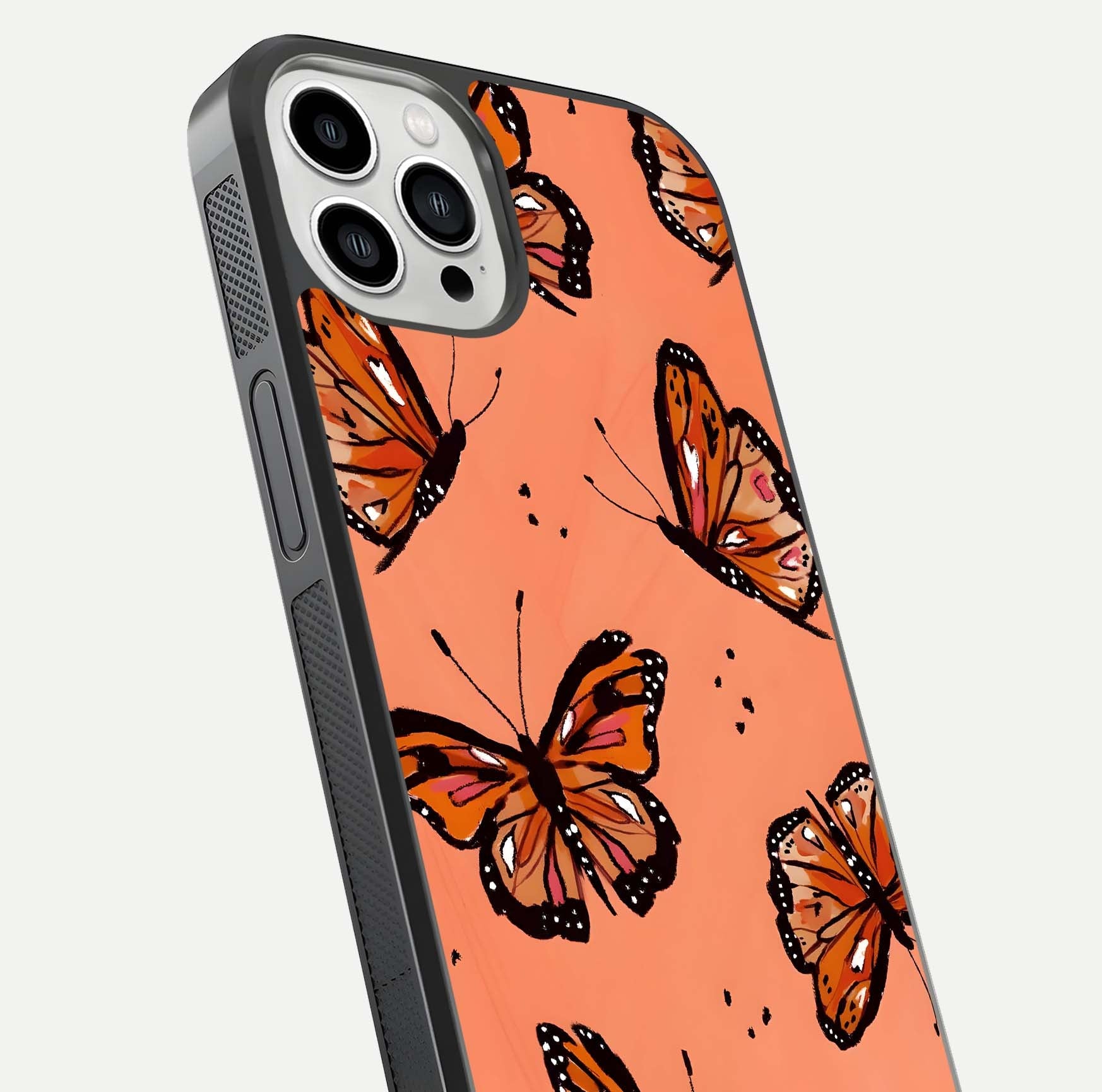 Coral Wing Butterfly Glass Case for iPhone 13 Pro Max close-up highlighting wing pattern, coral tones, and reflection shine