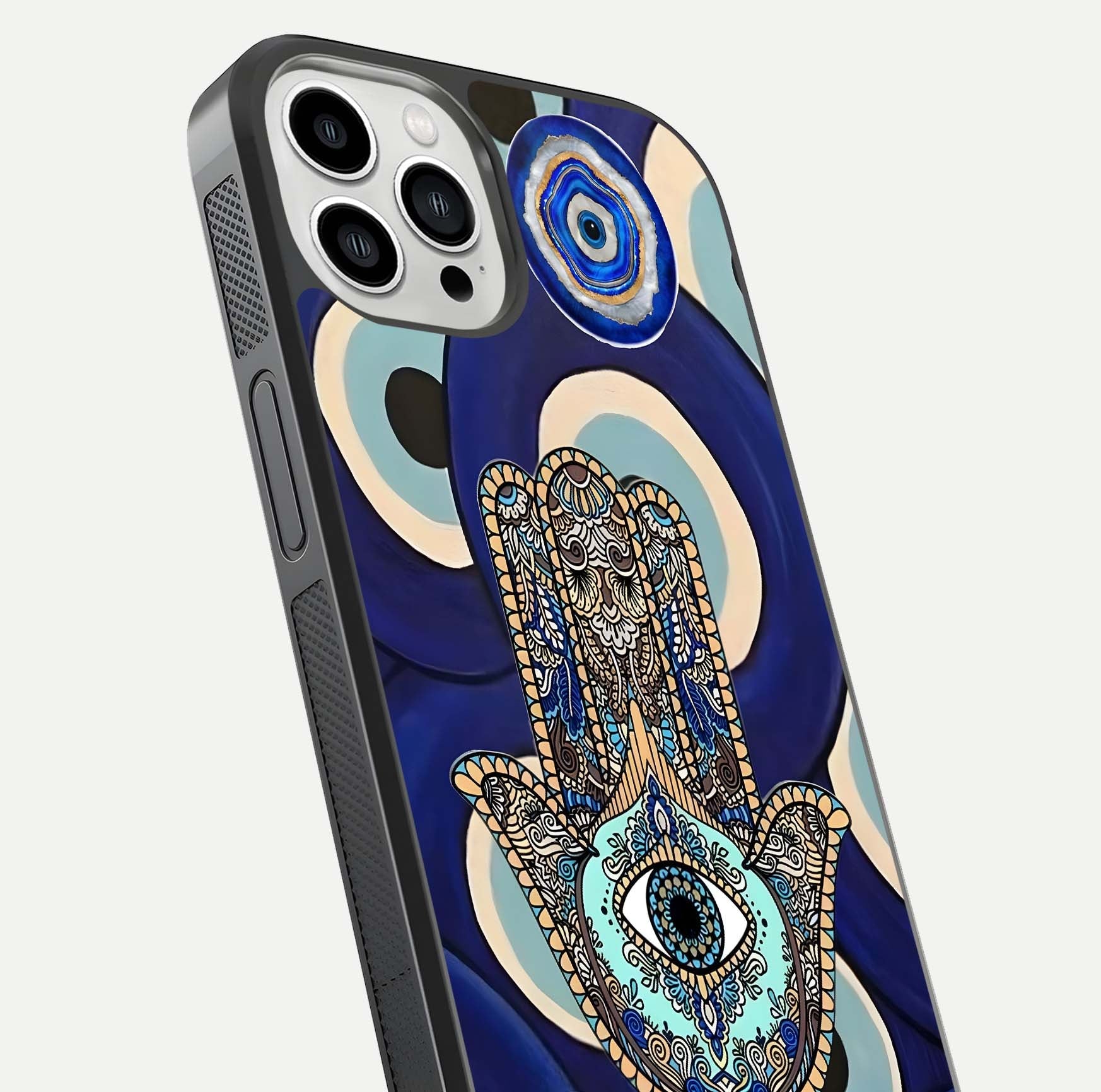 Hamsa Divine Guard Glass Case for iPhone 13 Pro Max close-up angled shot showing detailed palm motif and reflection glow