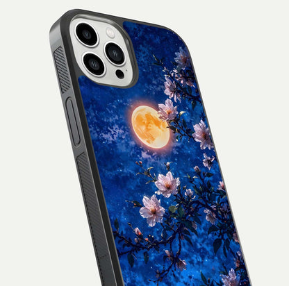 Moonlit Blossoms Night Glass Case for iPhone 13 Pro Max close-up angled shot showing petal glow and reflection detail