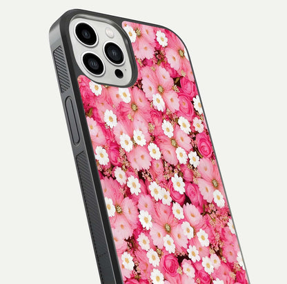 Pink Daisy Bliss Glass Case for iPhone 13 Pro Max close-up angled shot highlighting daisy detail and reflection glow
