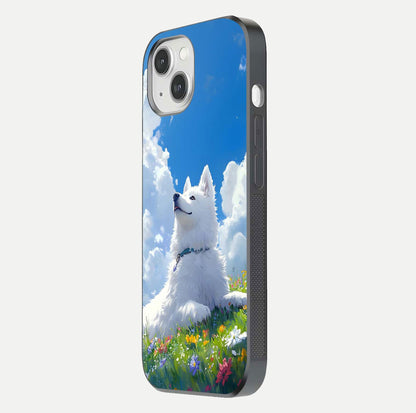 Blissful Cloud Pup Glass Case for iPhone 16 Pro side-angle shot displaying puppy print and glossy texture