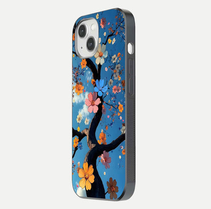 Blossom Dream Sky Glass Case for iPhone 16 Pro side-angle photo showing flower details, edge curve, and reflection shine