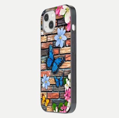 Brick Bloom Flight Glass Case for iPhone 14 side-angle photo showing curve shine and detailed petal contrast