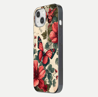 Crimson Butterfly Garden Glass Case for iPhone 14 side-angle photo capturing gloss texture and soft tone