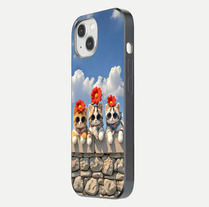 Floral Kitty Squad Glass Case for iPhone 14 side-angle photo showing reflection glow and polished surface