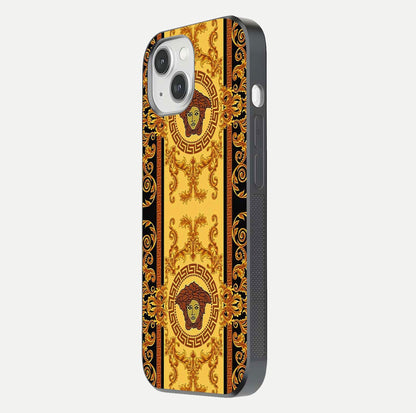 Golden Royal Heritage Glass Case for iPhone 14 side-angle image showing reflection glow and luxury detailing
