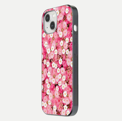 Pink Daisy Bliss Glass Case for iPhone 14 side-angle image showing delicate daisy pattern and glass reflection