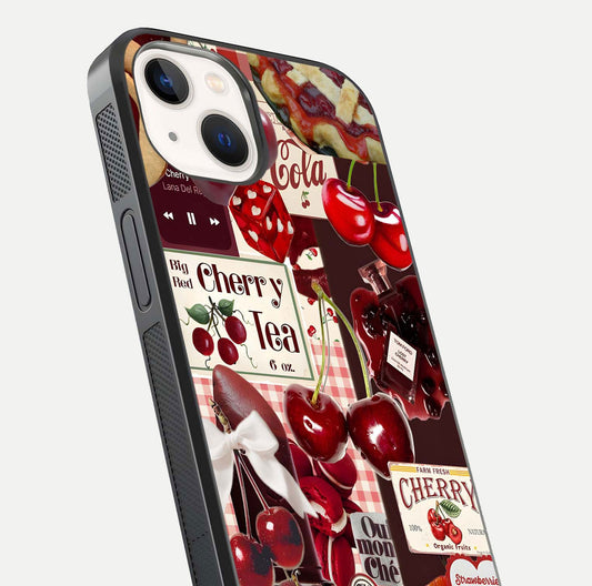 Aesthetic Cherry Tea Glass Case for iPhone 14 close-up angled shot showing detailed cherry artwork, red tones, and gloss reflection
