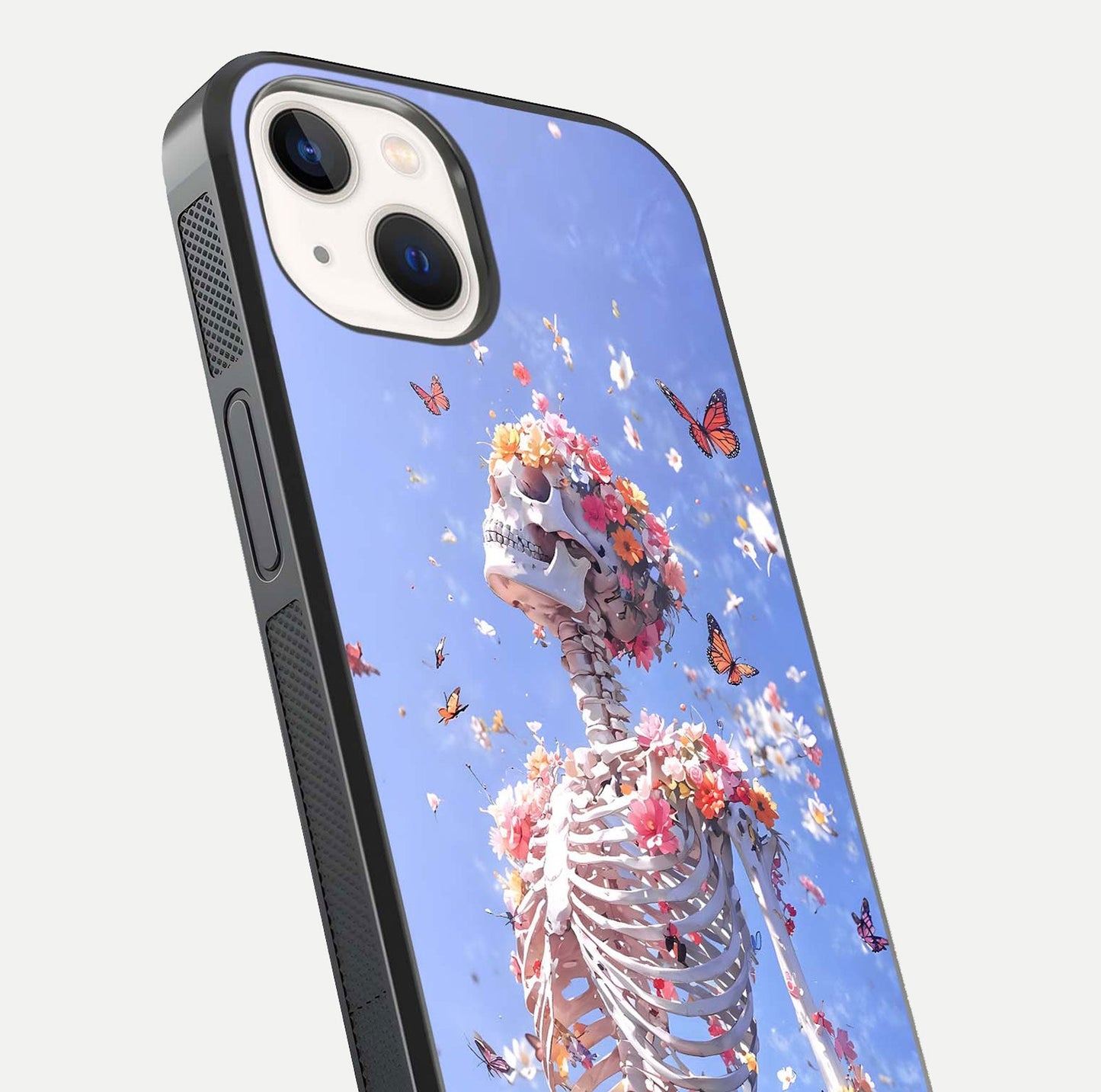 Bloom Beyond Bones Glass Case for iPhone 16 Pro close-up highlighting unique bone-floral fusion art and reflection
