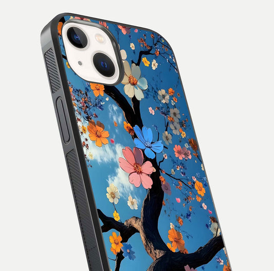 Blossom Dream Sky Glass Case for iPhone 14 close-up shot highlighting dreamlike clouds and pink blossoms